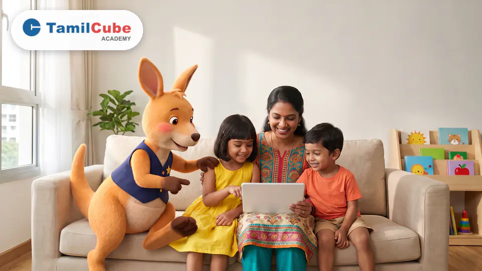 Tamil mother teaching her two young children on a tablet at home with Enthira Junior, Tamilcube Academy